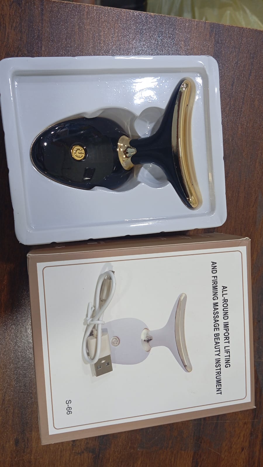 EMS Face Lifting Massager with Red Light Therapy.